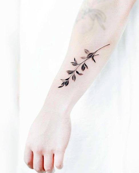Breathtaking Leaf Tattoo On Girl