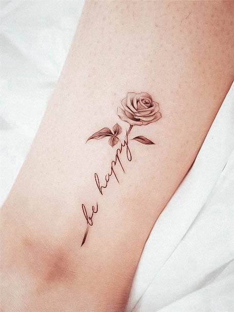 Breathtaking Lettering Tattoo On Girl Leg