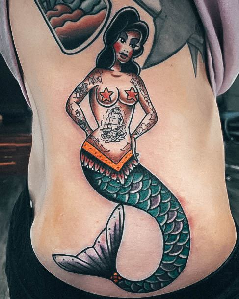 Breathtaking Mermaid Tattoo On Girl Rib Cage Side