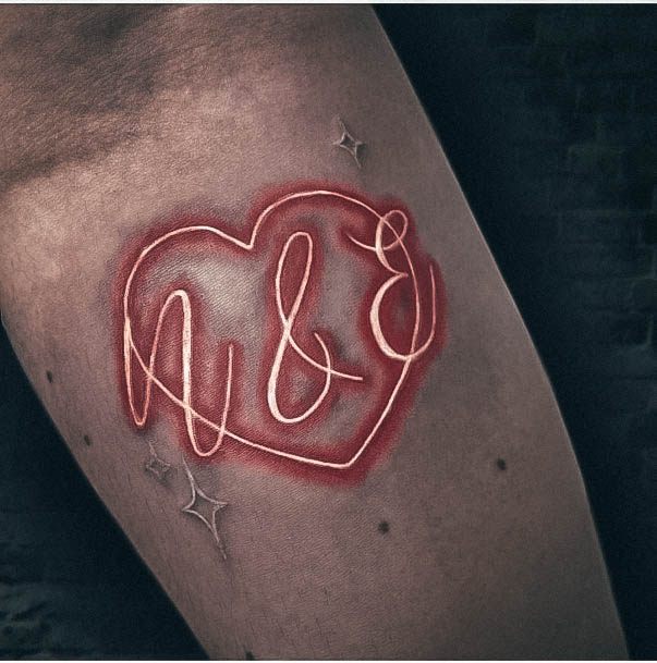 Breathtaking Neon Tattoo On Girl