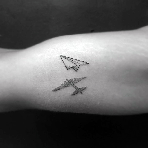 Breathtaking Paper Airplane Tattoo On Girl