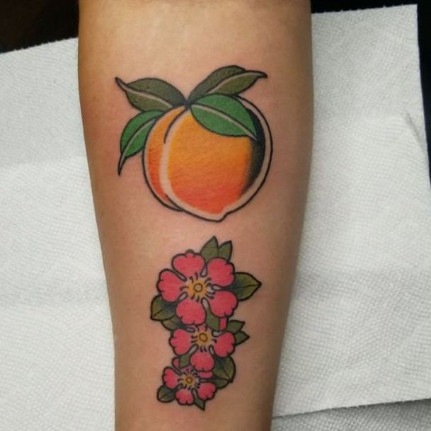 Breathtaking Peach Tattoo On Girl