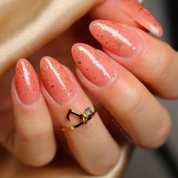 Breathtaking Peach With Glitter Nail On Girl