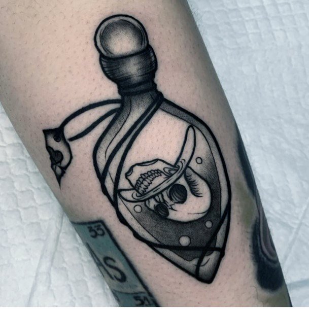 Breathtaking Poison Bottle Tattoo On Girl