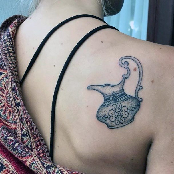 Breathtaking Pottery Tattoo On Girl