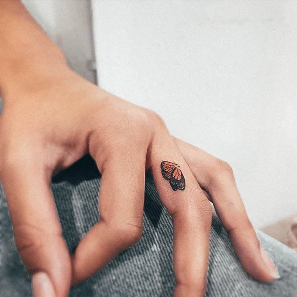 Breathtaking Tiny Tattoo On Girl Finger