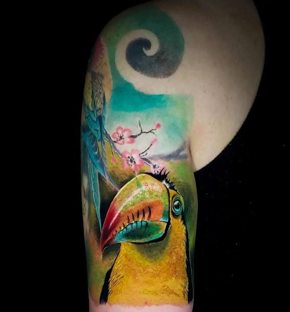 Breathtaking Toucan Tattoo On Girl