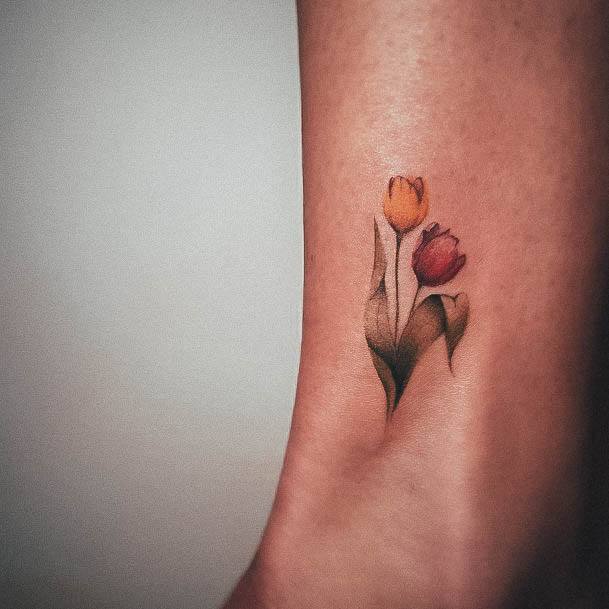 Breathtaking Tulip Tattoo On Girl