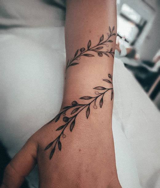 Breathtaking Vine Tattoo On Girl