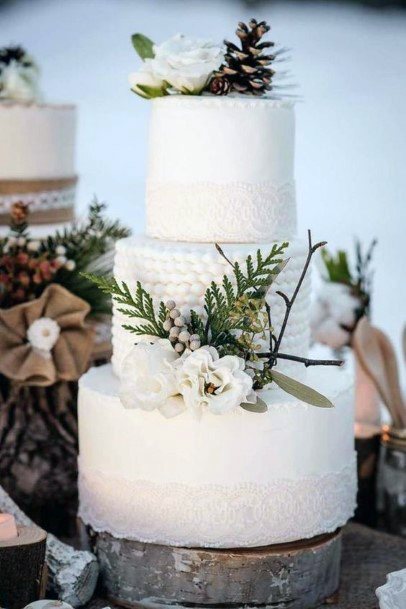 Breathtaking White Cake Christmas Wedding Flowers