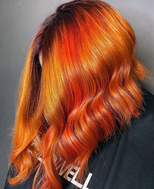 Bright And Bold Shiny Orange And Red Ombre Womens Hairstyle