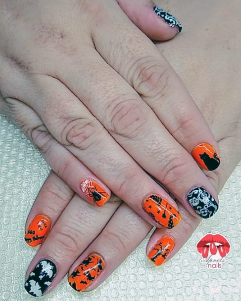 Bright Orange And Black Girly Nails For Halloween