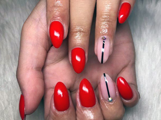 Bright Red Nails With Golden Lined Design For Women