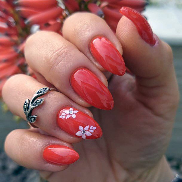 Bright Red Nails With White Blossom Accent For Women