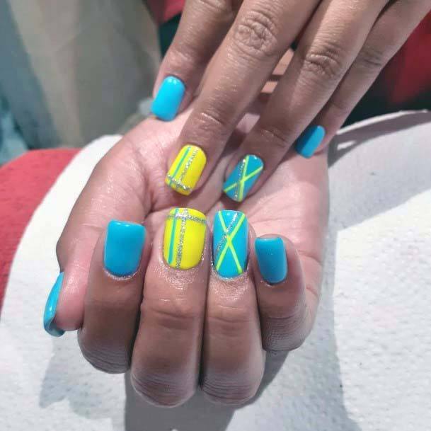 Bright Yellow And Blue Nails Cross Design For Women