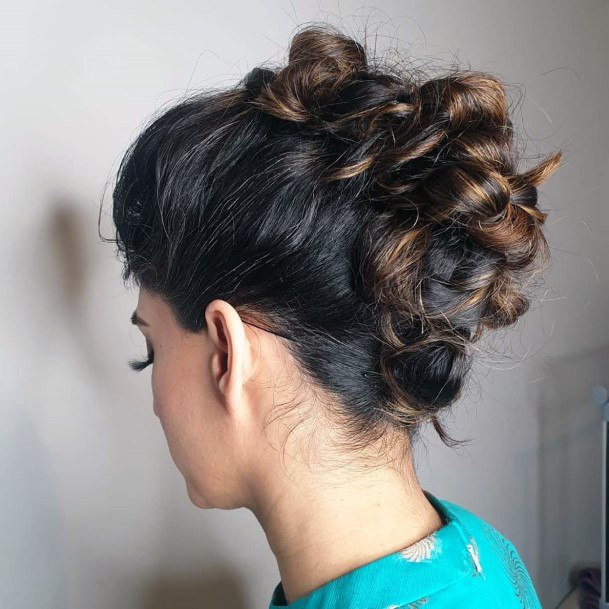 Brunette With All Pulled Up In A Neat Bunch Mohawk Hair Design