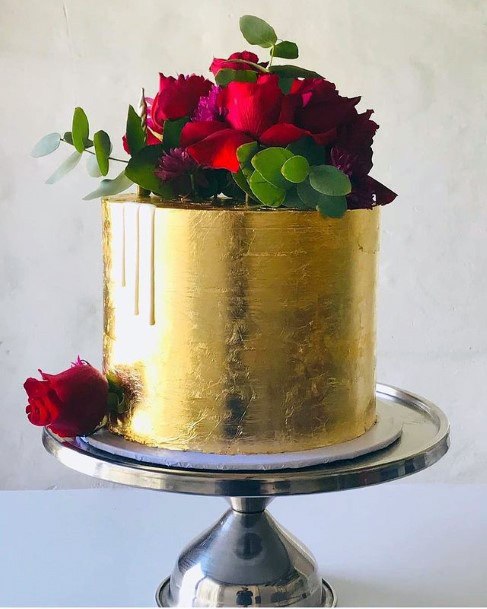 Bunch Of Red Roses On Golden Cake