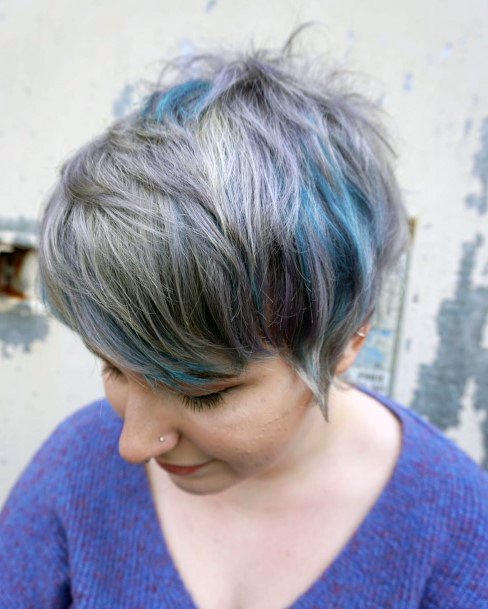 Busy Grey With Purple And Teal Coloration Showing A Spunky Short Cut Hairstyle