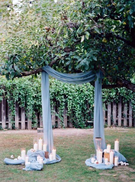 Candle Lit White Clothed Wedding Tree Decor