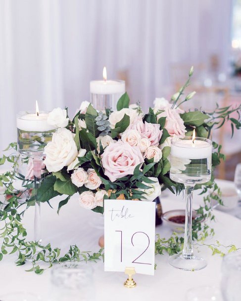 Candles And Blush Flowers Wedding