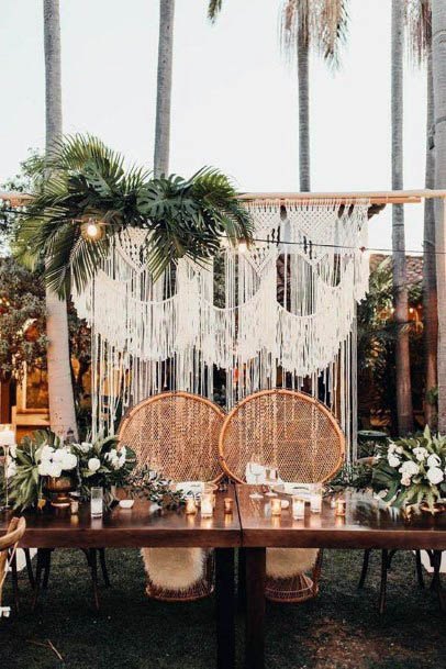 Cane Couple Chairs And Beach Wedding Flowers