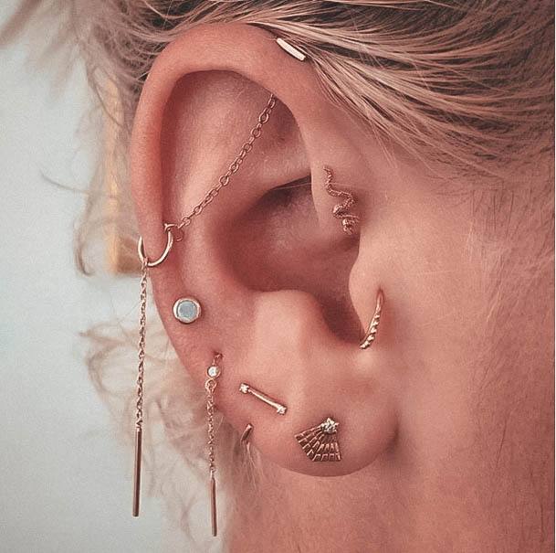 Captivating Forward Helic Chain Connected Tooutter Helix Multiple Lobe Tragus And Cute Snake Daith Ear Piercing Ideas For Women