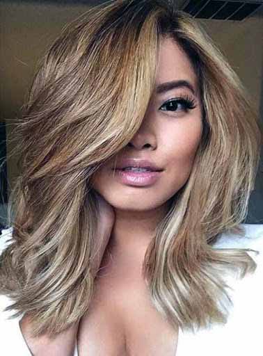 Caramel Blonde Side Parted Hairstyle Women