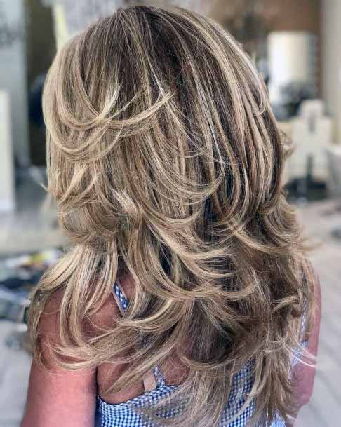 Cascading Ash Colored Hairstyle Women