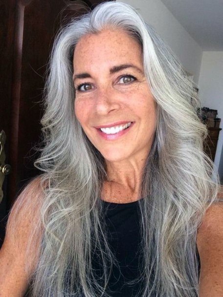 Cascading White Waves Hairstyles For Over 50 With Round Face