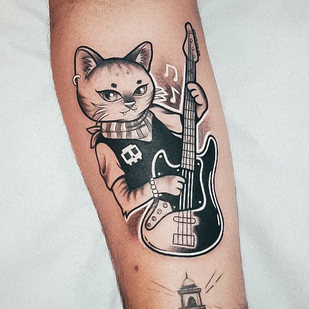 Cat Playing Guitar Tattoo On Female With White Ink Music Notes