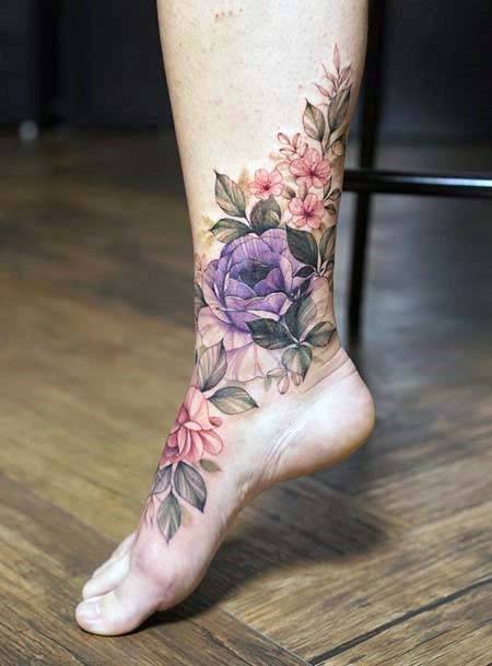 Charming Blooms And Anchor Tattoo Women Legs