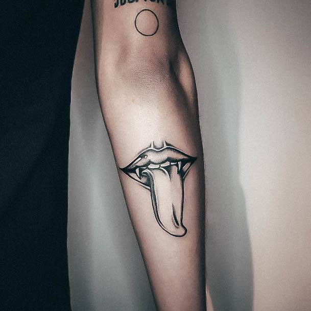 Charming Tattoos For Women Fangs