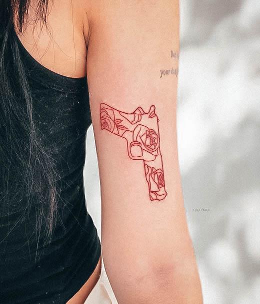 Charming Tattoos For Women Gun Tricep Red Ink Outline