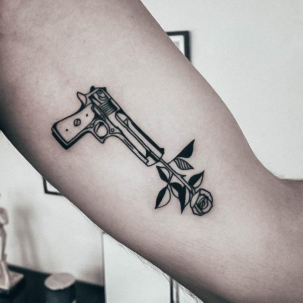 Charming Tattoos For Women Gun