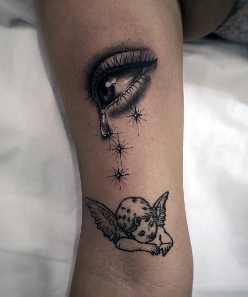 Cherubic Angel And Eye Tattoo With Tear Drop For Women On Hands