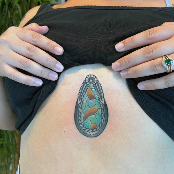 Chest Turquoise Tattoo For Women