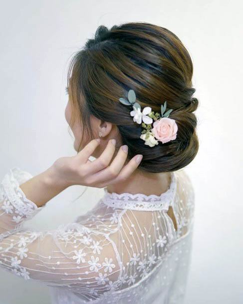 Chestnut Hair On Female With Tucked In Ends And Formal Headpiece