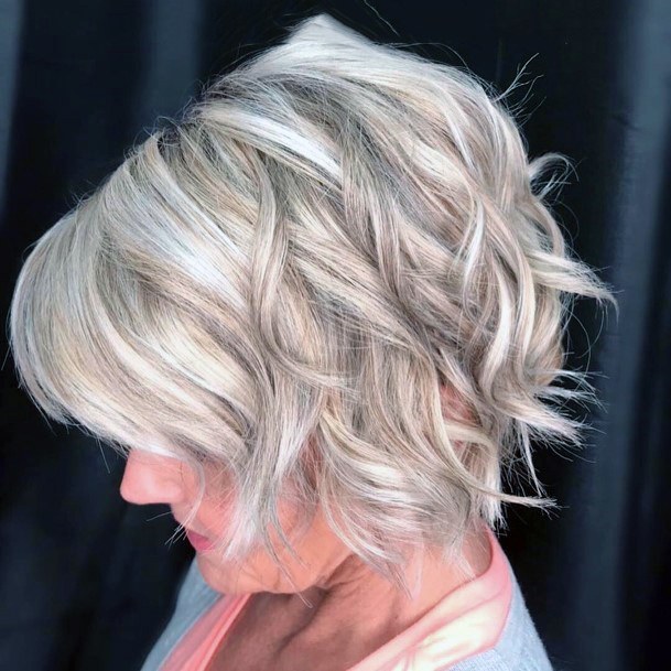 Chic Blonde Curly Bob Youthful Hairstyles Over 50
