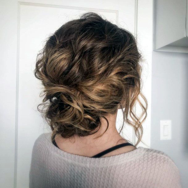 Chignon With Loose Tendrils Hairstyle For Women