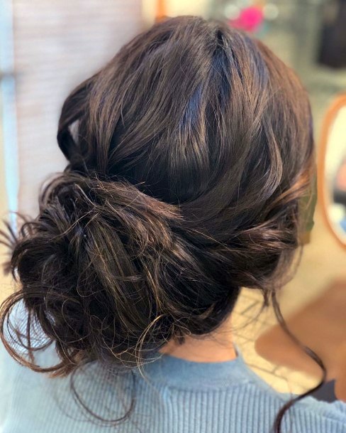 Chocolate Colored Loose Thick Bun Updo Hairstyles For Women