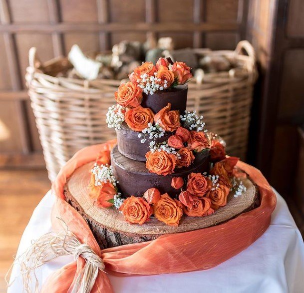 Chocolate Wedding Cake With Orange Roses