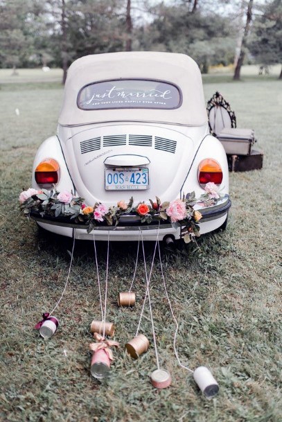 Clanking Tins Tied To Wedding Car Decor