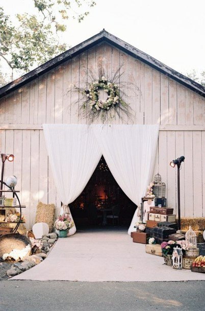 Classy Stunning White Barn Wedding Venue Pretty Curtain Floral Decoration Ideas