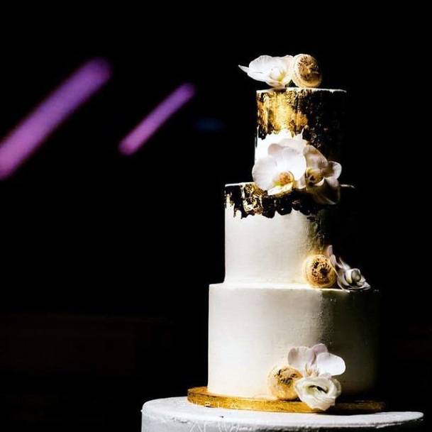 Classy White And Gold Wedding Cake