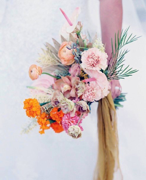 Cluster Of Yellow And Pink Wedding Flowers