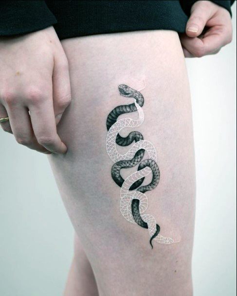 Coiled Snakes White Ink And Black Tattoo Womens Thighs