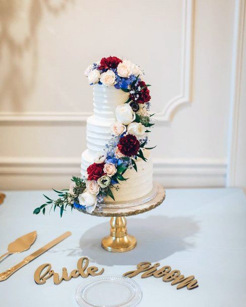 Colored Rose Creepers On 3 Tier Wedding Cake Women