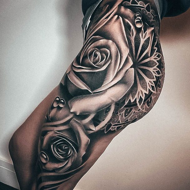 black and grey flower sleeve tattoos