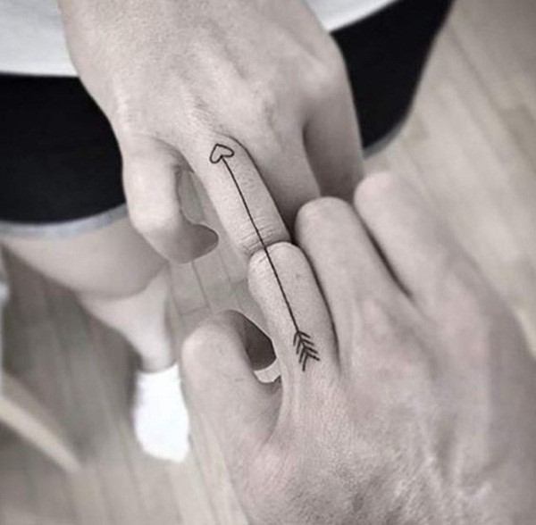 Commited Couple Tattoo Fingers