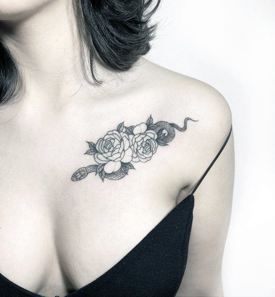 Common Grey Snake And Flowers Tattoo Womens Chest